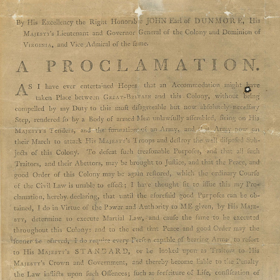 A printed broadside proclamation with black ink on brown paper