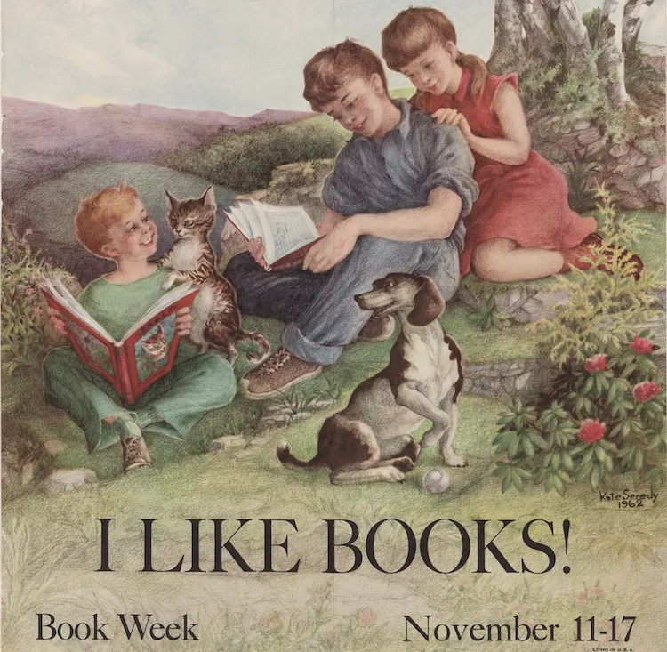 Image shows three children sitting in a field under a tree reading books. There is also a cat and a dog in the image. The image is captioned at the bottom "I like books! Book Week November 11-17"